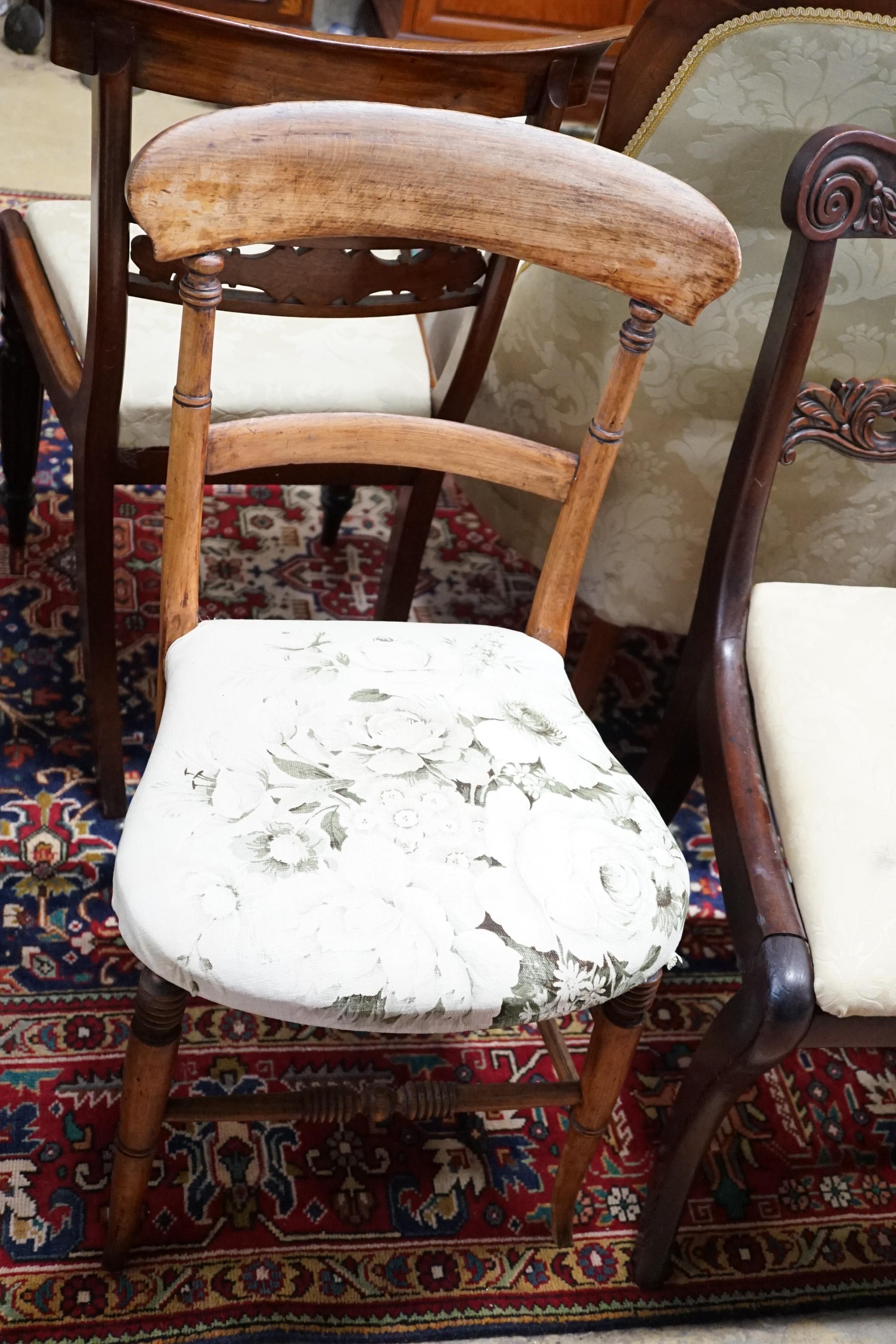 Two pairs of William IV mahogany dining chairs, a Victorian mahogany armchair and a bedroom chair